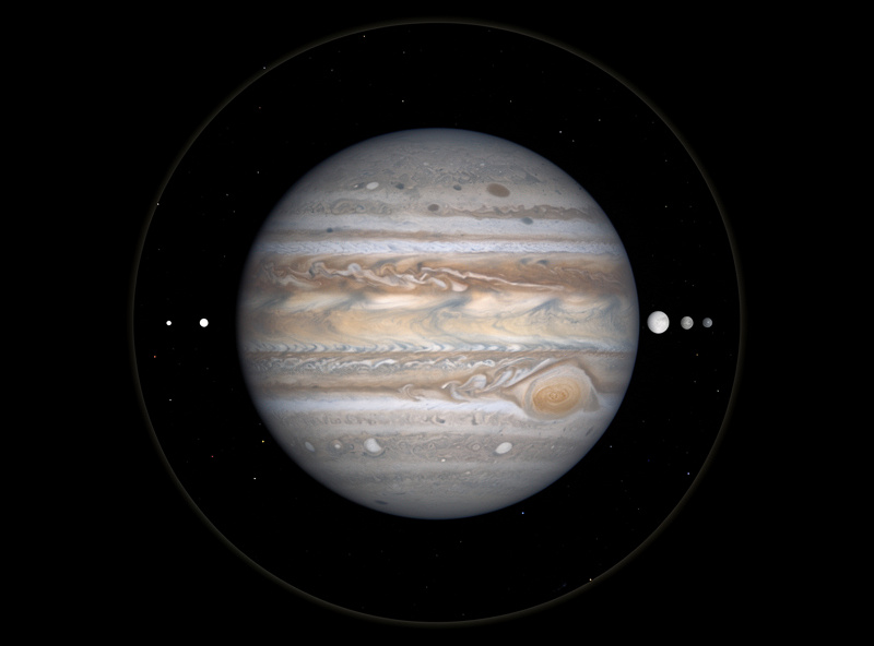 Telescope view of Jupiter showing horizontal cloud bands and the Great Red Spot