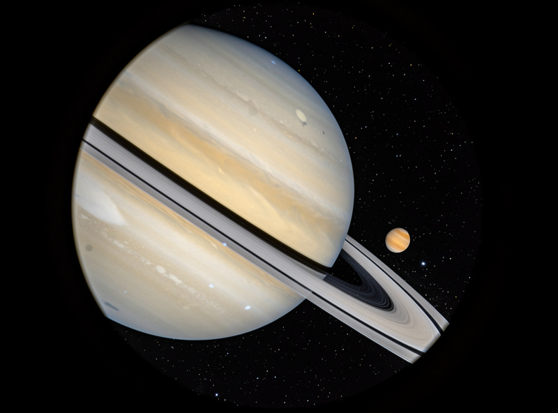 Saturn with rings at maximum tilt showing the Cassini Division and moon Titan