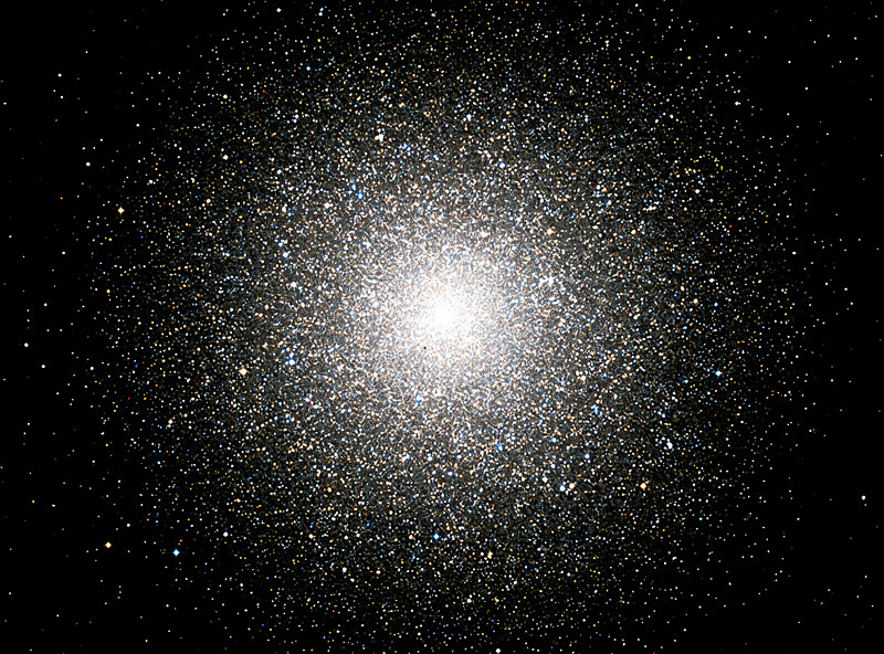 Globular star cluster M13 in Hercules showing hundreds of resolved stars in a spherical pattern