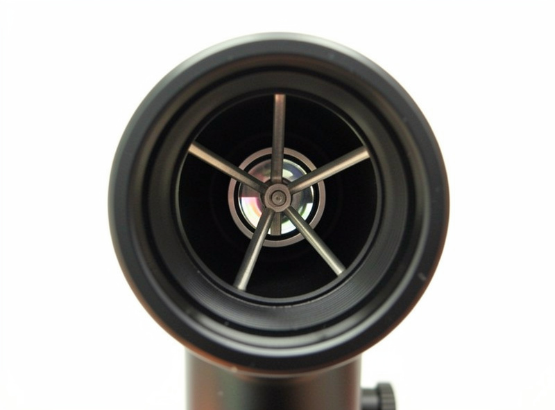 A reflector telescope's open tube showing the secondary mirror, suggesting collimation work