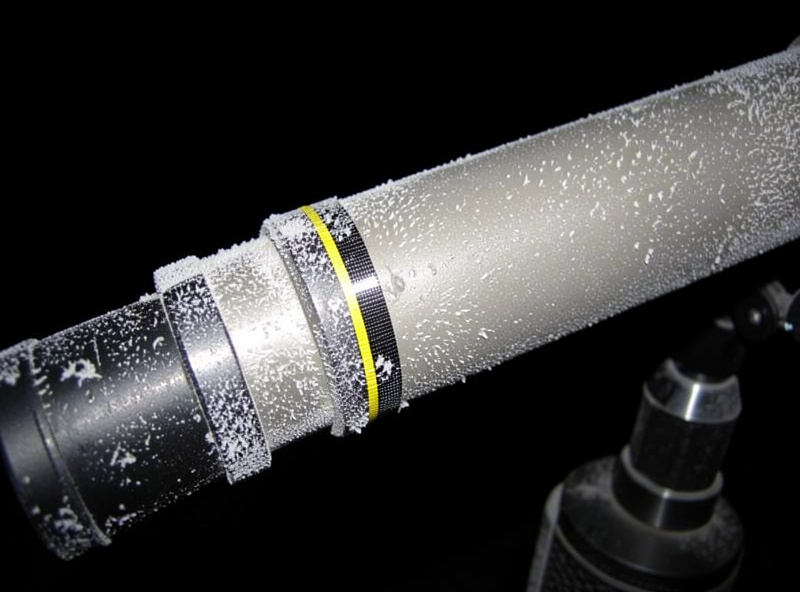 Telescope tube with a dew heater strip wrapped near the front element to prevent frost